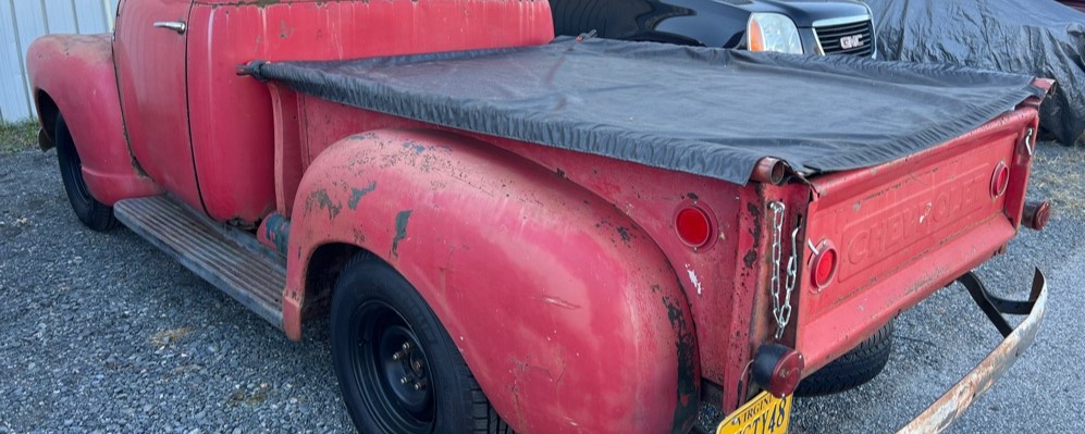 1948 Chevrolet 3100 Pick Up truck rear view vintage red chevy truck