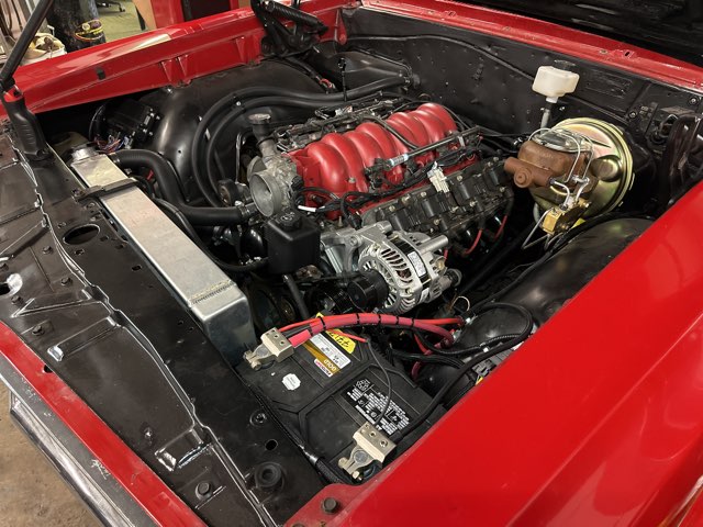 1965 Pontiac Lemans engine bay red