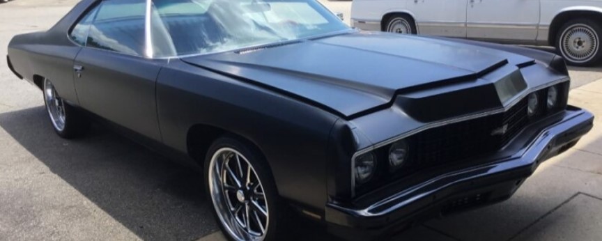 1973 Impala matte black side view